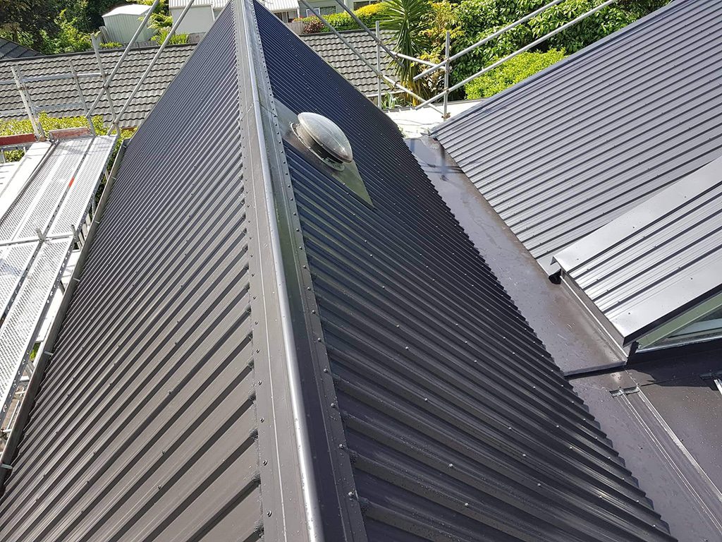 Skylight installation on metal roofing